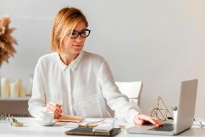 young-woman-writing-book.jpg